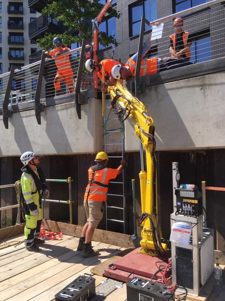 Working with the crane on a ScaffFloat pontoon