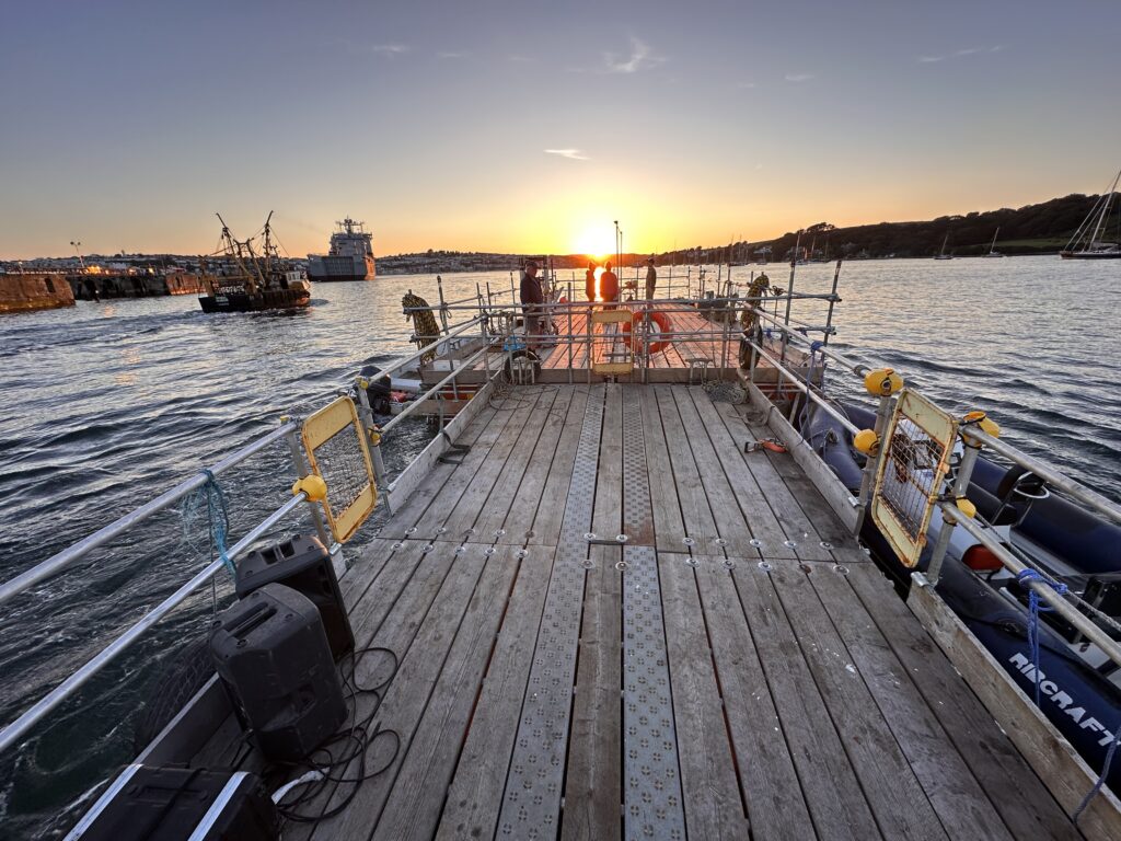 16x6.4 pushing an 8x3 pontoon in Falmouth underway stag party hero